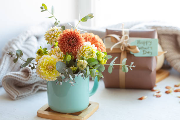 istock Festive composition for mother's day with gift box and flowers. 1365014751
