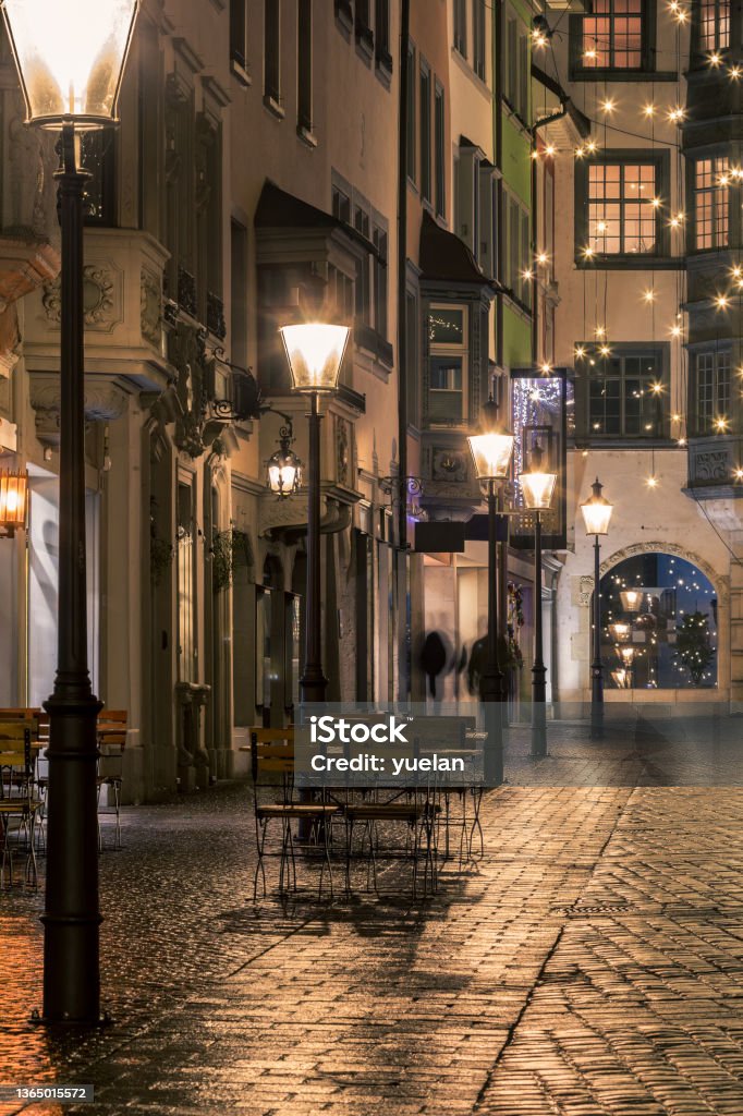 Street on Christmas season in the old town with holiday illuminations Night Stock Photo