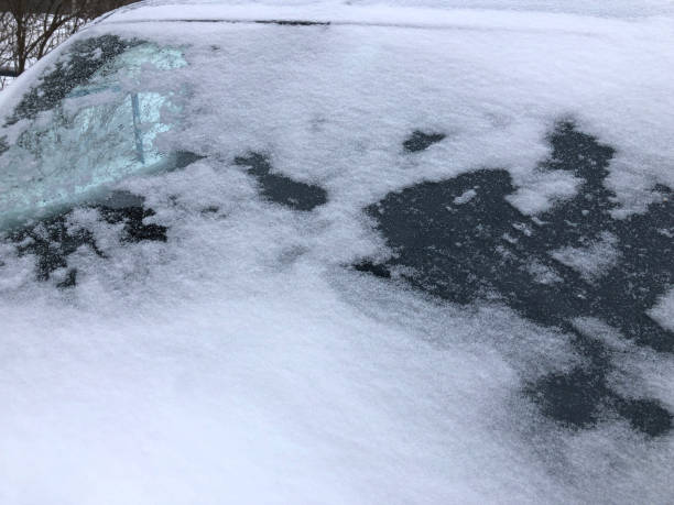 istock Close up frozen winter car covered snow, view front window windshield on snowy background 1365020868