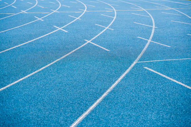 istock stadium blue tartan track -  texture. 1365021174