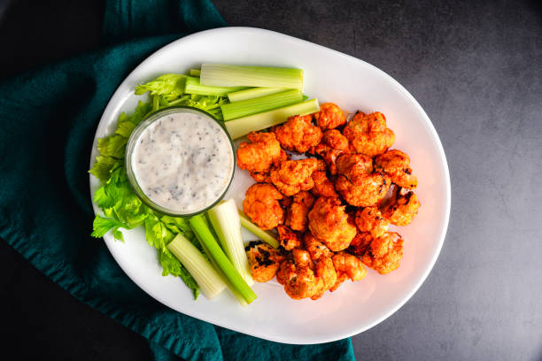 istock Buffalo Cauliflower Bites Served with Celery Sticks and Ranch Dressing 1365027483
