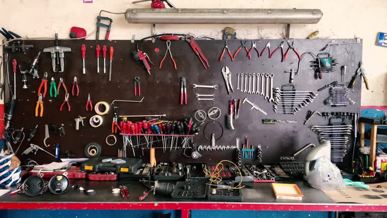 Set of tools on wall, Repair equipment hanging on the wall of a car mechanic, Wrench, Toolbox