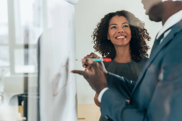 istock Business colleagues discussing ideas 1365031697