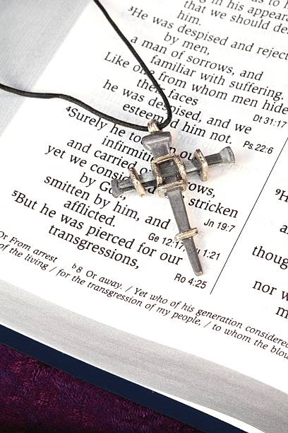 istock Isaiah Bible Scripture with Cross of Nails 136503198