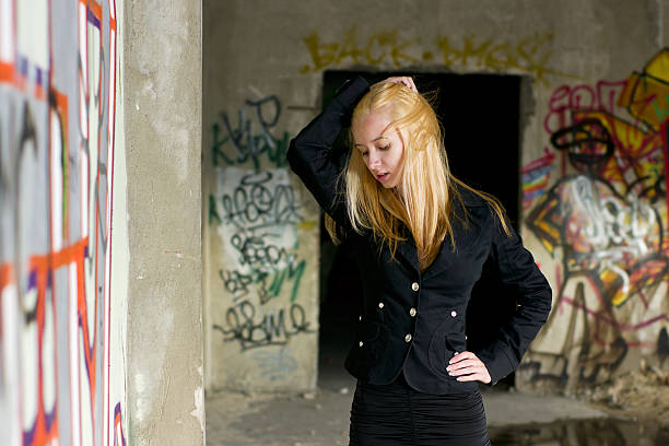 istock Young woman posing near wall 136503204