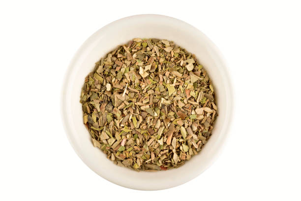 istock Oregano Seasoning in Bowl Isolated on White Background with Clipping Path 1365033754