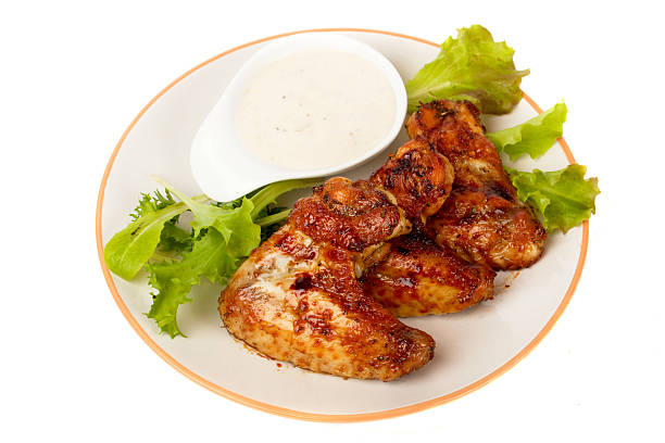 istock Grilled chicken wings isolated on white 136503825