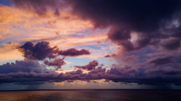istock Colourful sunrise  over the sea and a beautiful cloudscape 1365038844