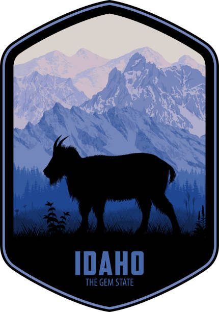 векторный знак айдахо с козлом скалистых гор в белых облачных горах - idaho mountains stock illustrations