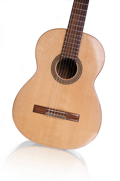 istock Classical acoustic spanish guitar isolated on white background 136504231