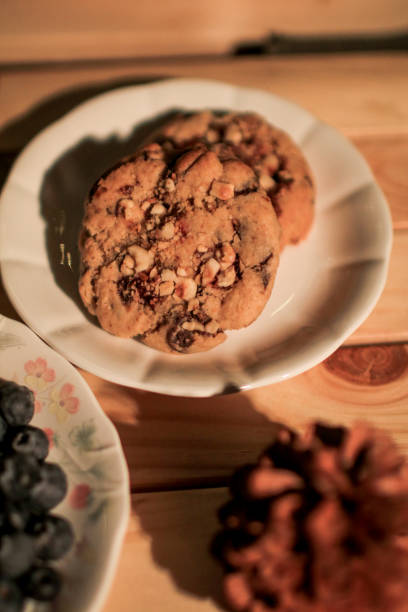 istock Chocolate cookies on dark background. Freshly baked. Selective Focus with Copy space. 1365044487