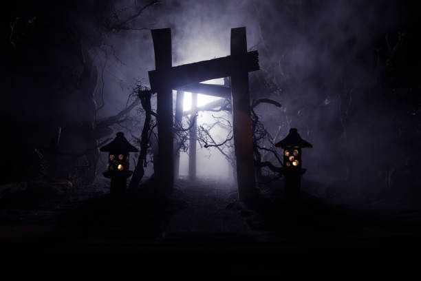 istock Creative artwork decoration. Abstract Japanese style wooden tunnel at night. Selective focus 1365045320