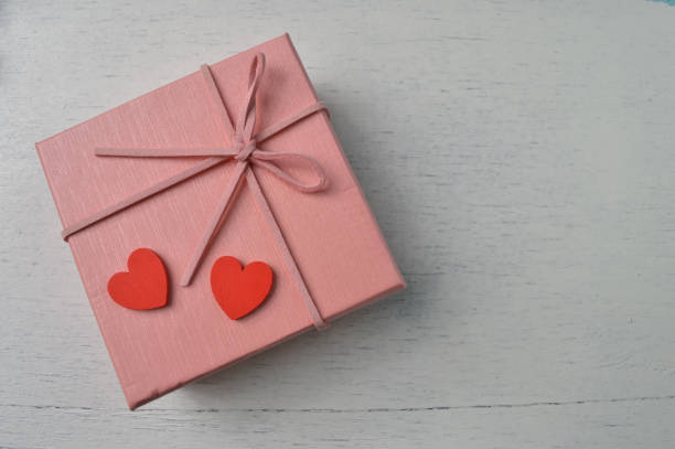 istock Pink box and love shapes with cope space for the text 1365046365