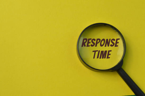 istock Magnifying glass isolated on a yellow background with text RESPONSE TIME 1365052689