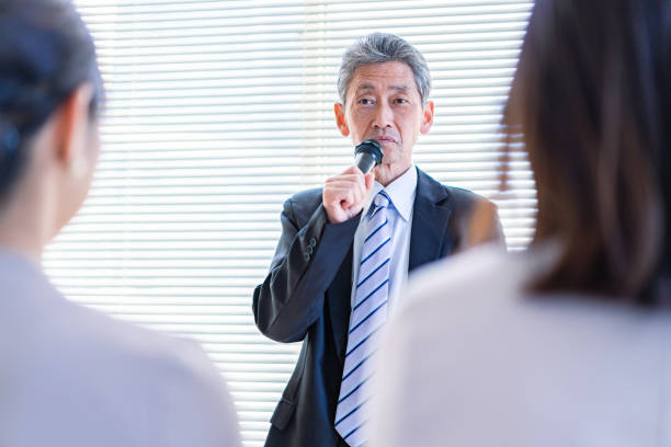 istock Politician giving a speech with a microphone 1365053721