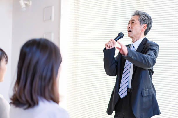 istock Politician giving a speech with a microphone 1365053726