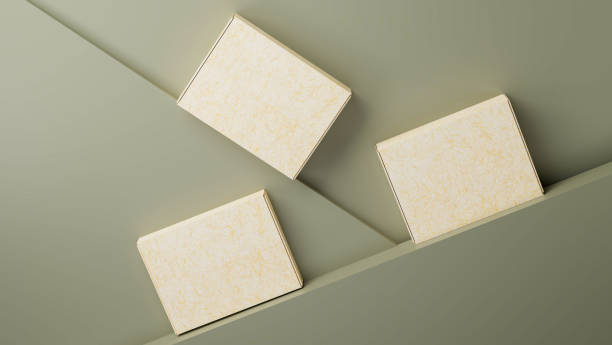 istock Beautiful cardboard box packaging on green geometric pedestal display. 1365059394