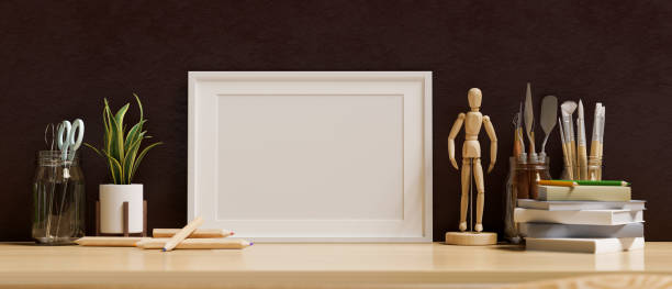 istock Picture frame mockup on a table with home decorations 1365059401