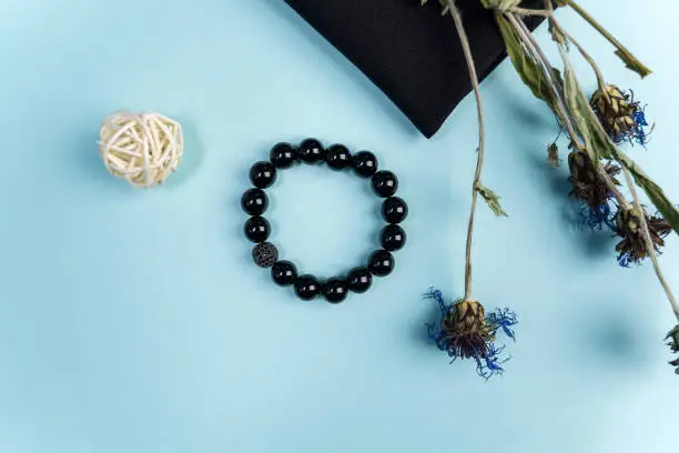 Handmade bracelet made of agate stones close-up. Handmade bead bracelet.
