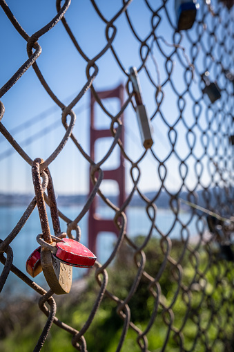 Locks on a chainlink fence at Battery Spencer, overlooking the Golden Gate Bridge.