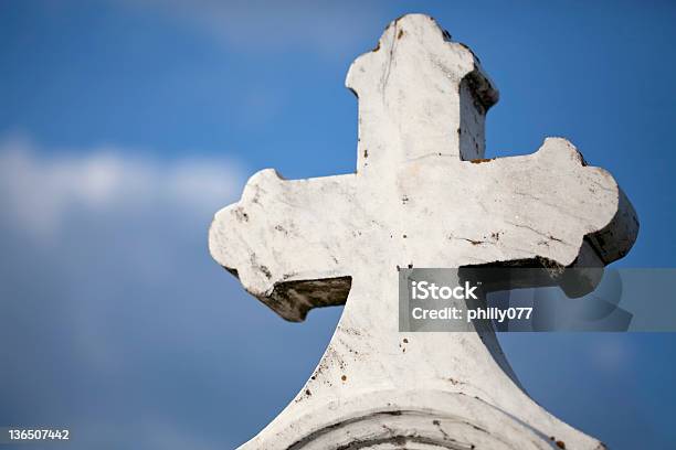 Stone Cross At Cemetary Stock Photo - Download Image Now - Blue, Catholicism, Cemetery