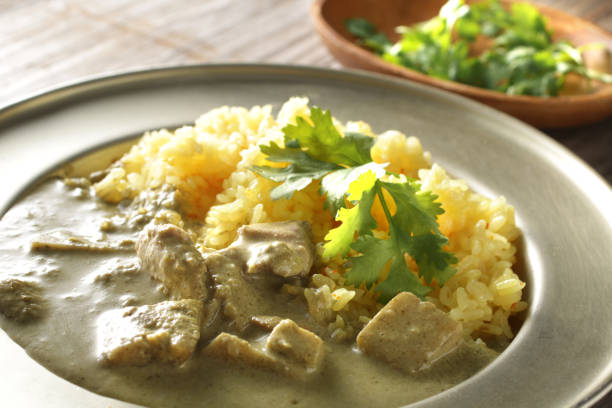 istock Coconut flavored Thai curry and coriander leaves 1365078662