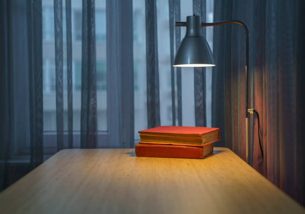 Books stand on the table at home