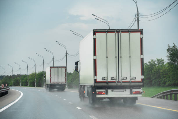 istock Truck drives in the rain 1365078945