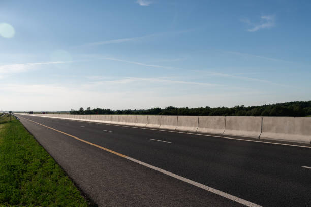 istock Empty multi-lane highway at summer sunny day 1365078974