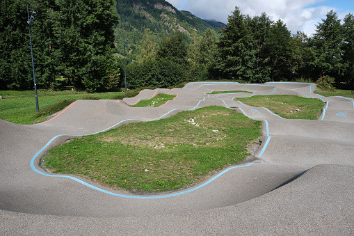 bicycle pumptrack circuit , outdoor race track surrounded by nature in Loudenvielle, France.