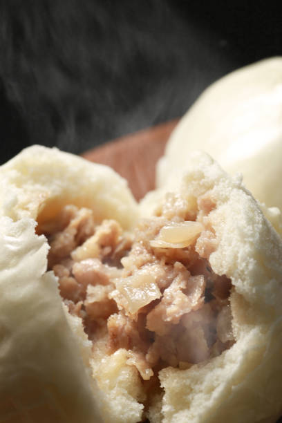 istock Hot steamed meat buns and pork buns 1365085524