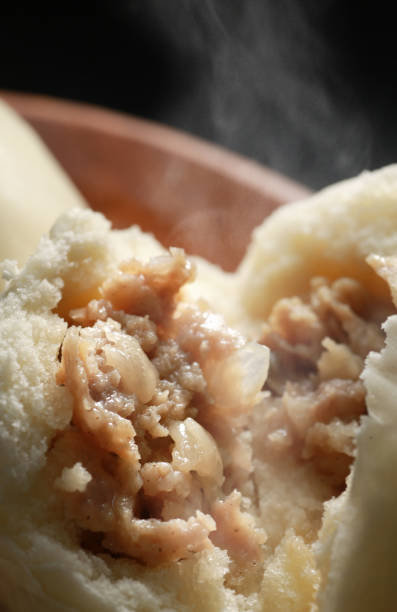 istock Hot steamed meat buns and pork buns 1365085525