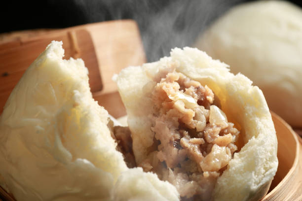 istock Hot steamed meat buns and pork buns 1365085528