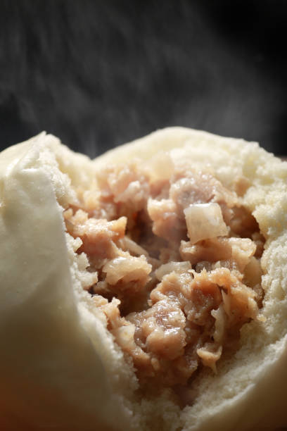 istock Hot steamed meat buns and pork buns 1365085535