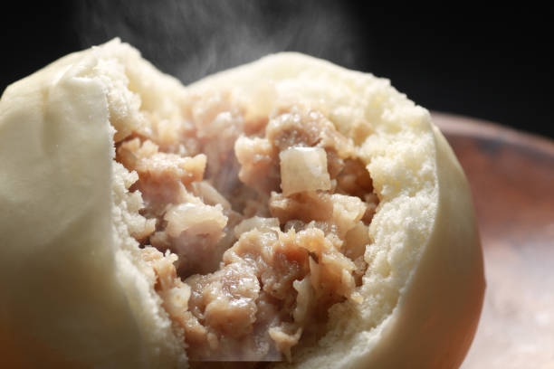 istock Hot steamed meat buns and pork buns 1365085537