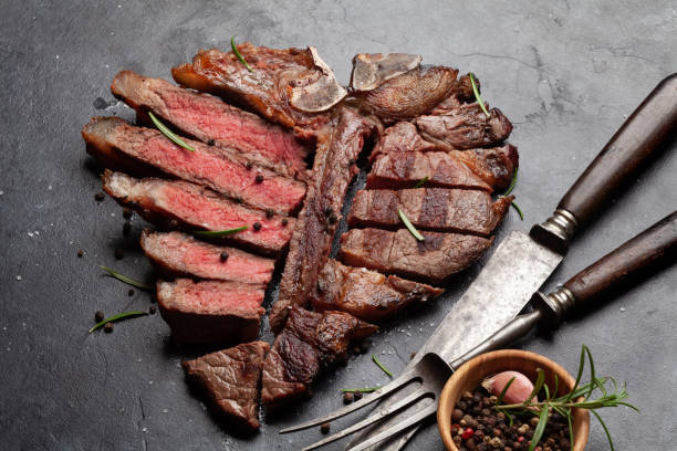 istock Grilled porterhouse beef steak. Sliced T-bone 1365087697