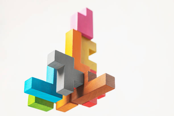 istock Abstract construction from wooden blocks. The concept of logical thinking. 1365088771