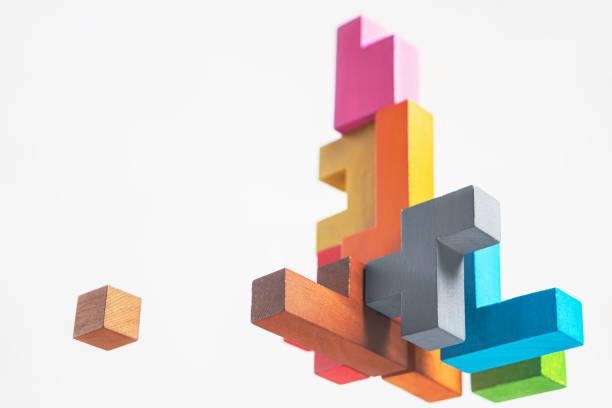 istock Abstract construction from wooden blocks. The concept of logical thinking. 1365088772