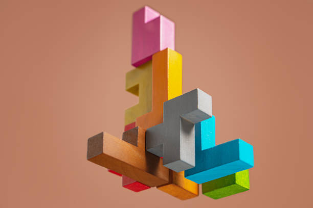 istock Abstract construction from wooden blocks. The concept of logical thinking. 1365088780