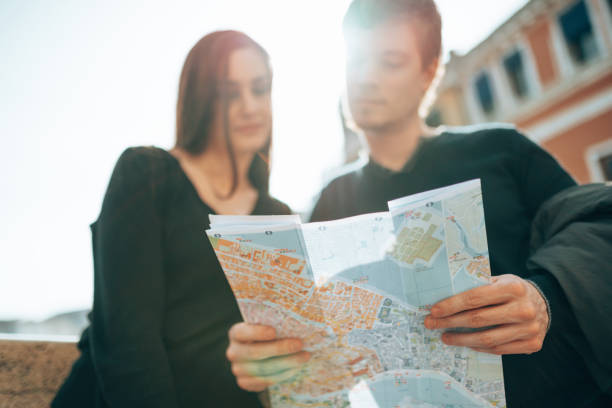 istock tourist reading a map in venice 1365092259