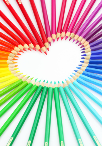 Used rainbow colored pencils isolated on white background with clipping path