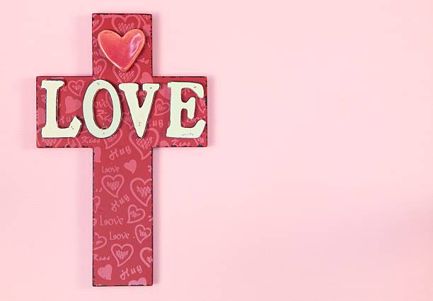 istock LOVE Cross on Pink Paper 136509455