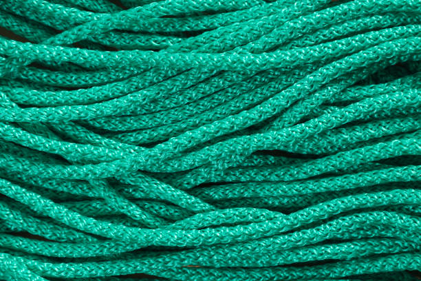 istock Green rope close-up, texture background 1365098453