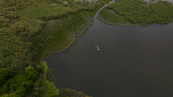 aerial view of boat and peoples going on lake. Turkey/Bursa-Golyazi