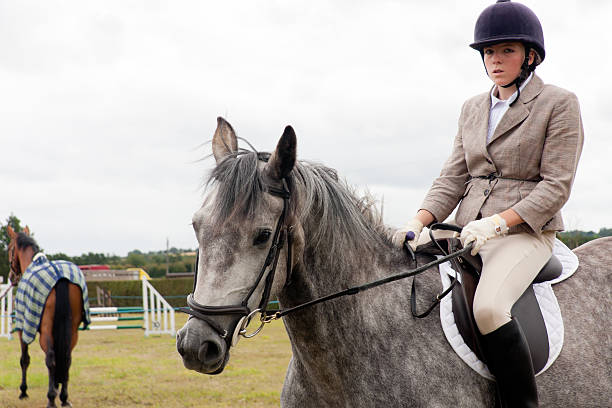 istock Competition time-young rider prepares to compete. 136510694