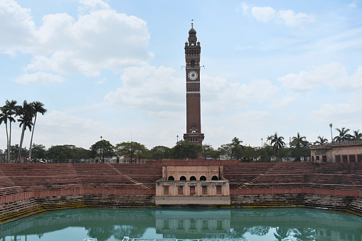 Husainabad Clock Tower - Ghanta Ghar and Talab - Pond with red stoned stairs constructed by Nawab Nasir-ud-din Haider in the year 1881. Lucknow, Uttar Pradesh