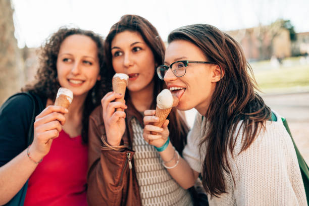 istock happiness friends licking the icecream 1365116558