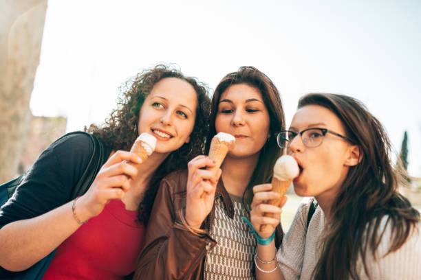 istock happiness friends licking the icecream 1365116646