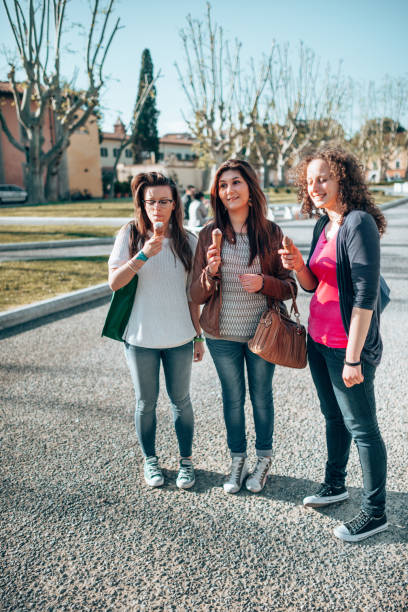 istock happiness friends licking the icecream 1365116733