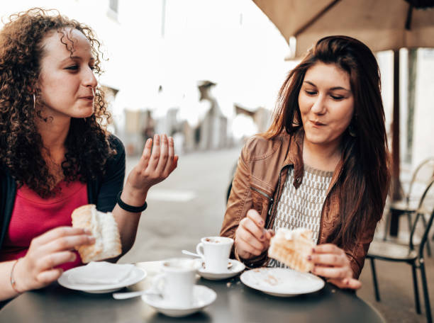 istock women together doing breakfast at the cafe 1365117984